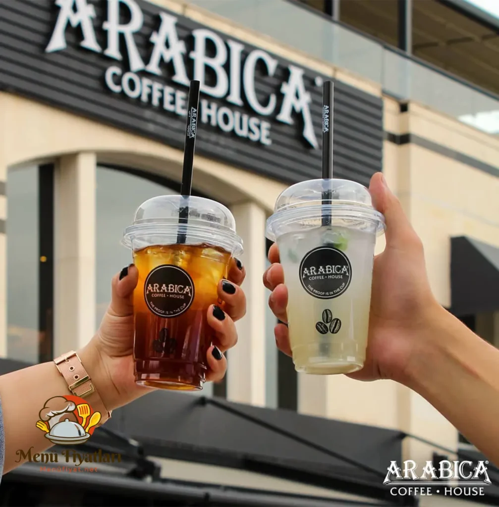 Arabica Menü Fiyatları 2024 - Güncel Menü Fiyat Tabloları - Kahve, dünyanın en çok tüketilen içeceklerinden biridir. Kahve severler, farklı aromaları, tatları ve sunumları denemek için yeni mekanlar arayışındadır. Bu arayışın sonucunda, kaliteli ve lezzetli kahveleri ile dikkat çeken Arabica Coffee House markası ortaya çıkmıştır. Arabica Coffee House, Türkiye’nin 35 şehrinde 110 şubesi ile hizmet vermektedir. Arabica menü fiyatları 2024 yılında da uygun ve cazip seçenekler sunmaktadır. Bu yazımızda, Arabica menü fiyatları 2024 hakkında detaylı bilgi vereceğiz.